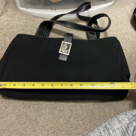 RLL on this lightly used bag, black material and black leather shoulder straps. - Picture 7 of 8